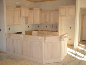 Raised Panel Hardwood Cabinets with Custom Crown Moldings in our Cypress Model.